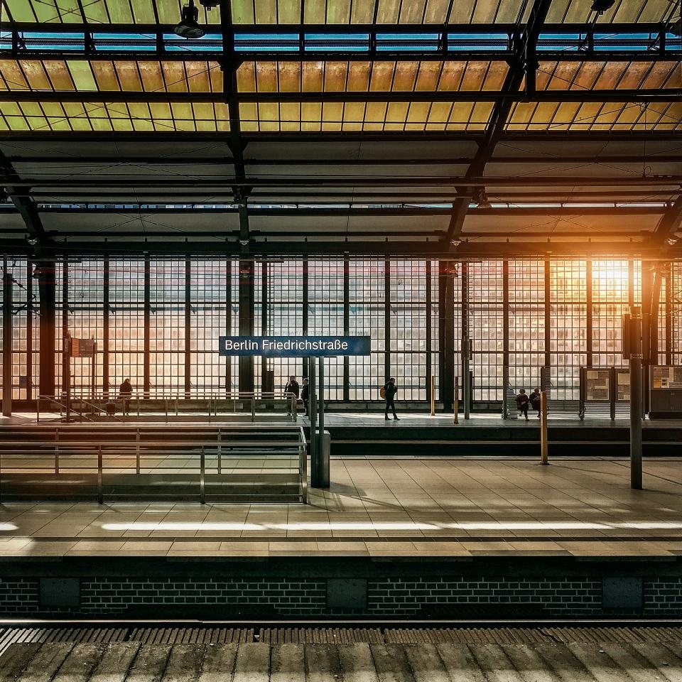 Railway tracks leading into a station
